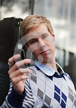 Young guy with cameraphone