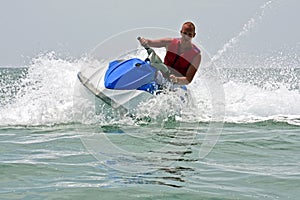 Young guy cruising on the atlantic ocean