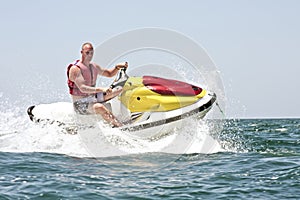 Young guy cruising on the atlantic ocean