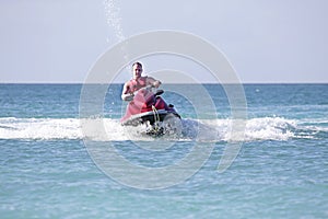 Young guy cruising on the caribbean sea