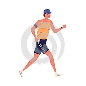 Young guy jogging with armband. Man running in summer sportswear. Sport activity. Male in shorts and trainers. Cardio
