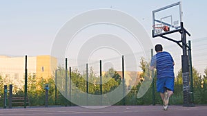 Young Guy Play Street Basketball