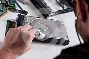 Young guy is scanning electronic device