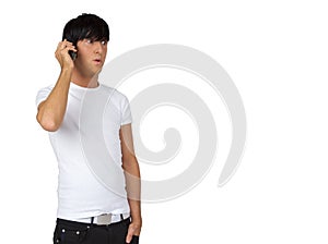 Young guy speaking on cell phone