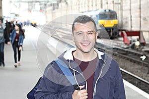 Young guy in train station