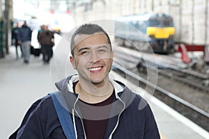 Young guy in train station