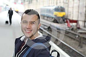Young guy in train station