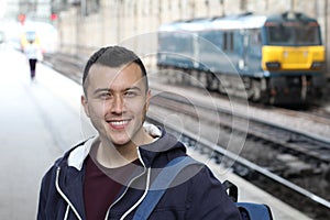 Young guy in train station