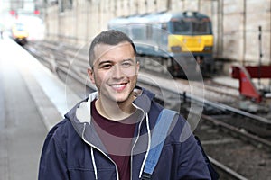 Young guy in train station