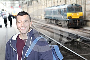 Young guy in train station