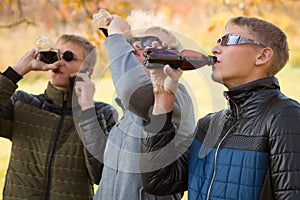 Young guys drink beverages