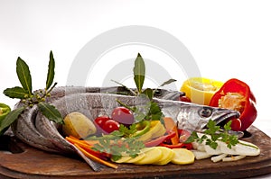 Young hake prepared for cooking with vegetables.