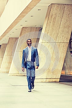 Young Handsome African American Businessman traveling, working i