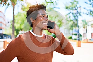 Young handsome african american man wearing casual clothes smiling happy