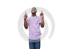 young handsome african man in lilac t-shirt has radiates confidence