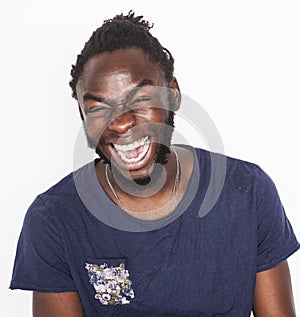 Young handsome afro american boy in stylish hipster closers gesturing emotional isolated on white background smiling