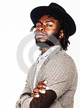 young handsome afro american boy in stylish hipster hat gesturing emotional isolated on white background smiling