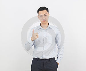 Young handsome asian business man smiling and showing thumbs up isolated on white background.