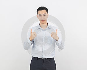 Young handsome asian business man smiling and showing thumbs up isolated on white background.