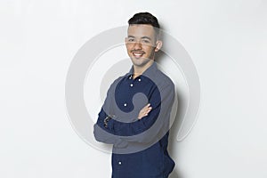 Young handsome business man isolated on white background