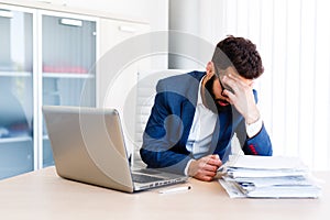 Young Handsome Businessman Has Headache