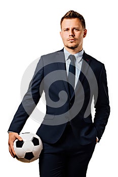 Young handsome businessman holding a football isolated on white background studio.