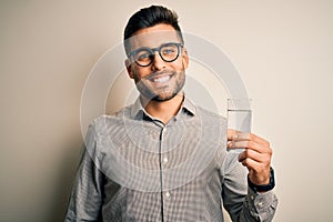 Young handsome businessman wearing glasses and shirt