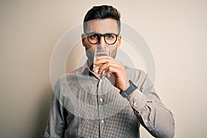 Young handsome businessman wearing glasses and shirt