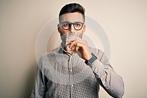 Young handsome businessman wearing glasses and shirt