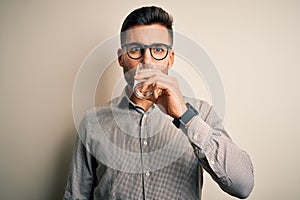 Young handsome businessman wearing glasses and shirt