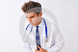 Young handsome doctor man wearing stethoscope over isolated white background with hand on stomach because nausea, painful disease