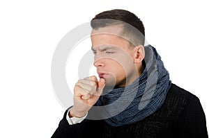 Young handsome guy falls ill. Cold and runny nose