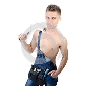 Young handsome handyman. White background.
