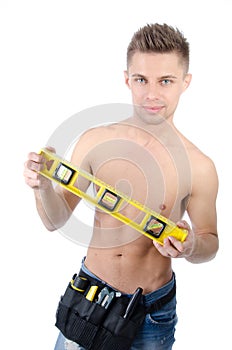 Young handsome handyman. White background.