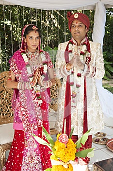 Young handsome Hindu bridal couple in traditional attire with wedding ceremony make up