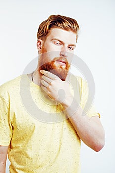 Young handsome hipster bearded guy looking brutal isolated on white background, lifestyle people concept