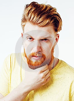 Young handsome hipster ginger bearded guy looking brutal isolated on white background, lifestyle people concept