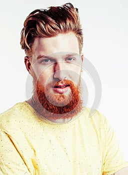 Young handsome hipster ginger bearded guy looking brutal isolated on white background, lifestyle people concept