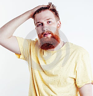 Young handsome hipster ginger bearded guy looking brutal isolated on white background, lifestyle people concept
