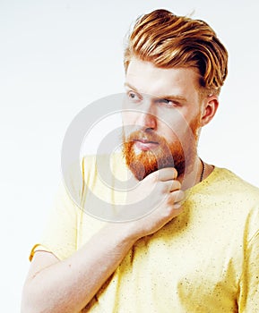 young handsome hipster ginger bearded guy looking brutal isolated on white background, lifestyle people concept