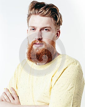 young handsome hipster ginger bearded guy looking brutal isolated on white background, lifestyle people concept