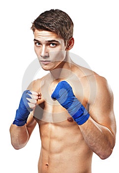 Young handsome male boxer fighter