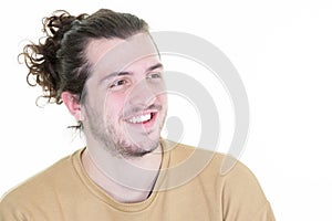 Young handsome man with beard long hair standing over white background looking away to side with smile natural expression laughing