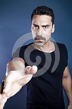Young handsome man with beard and mustache studio portrait