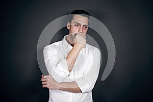 Young handsome man with beard and mustache studio portrait