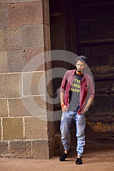 Young and handsome man with checked shirt