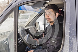 young handsome man driving i