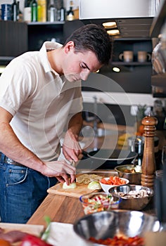 Young handsome man in kitchen