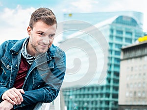 Young handsome man lookig. Gorgeous guy posing