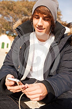 Young handsome man portrait with headphones